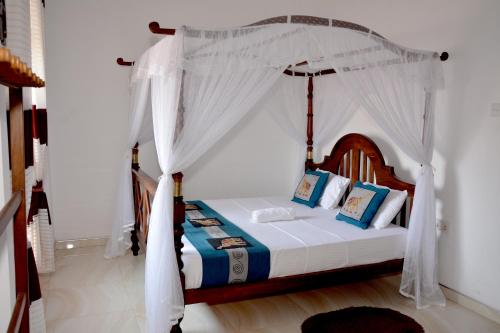 Sumimal Resort Polhena 객실 침대
