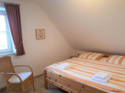 Ένα ή περισσότερα κρεβάτια σε δωμάτιο στο Ferienhof Christian und Antje Hopp