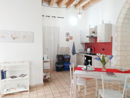 Η κουζίνα ή μικρή κουζίνα στο Appartamento Dammuso Isola Di Ortigia