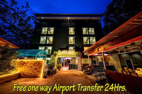 a view of a building at night at Naiyang Place - Phuket Airport in Nai Yang Beach