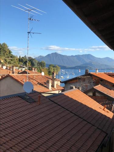 a view of the ocean from the roof of a house at Ballatoio Apartment by the Lake in Lesa