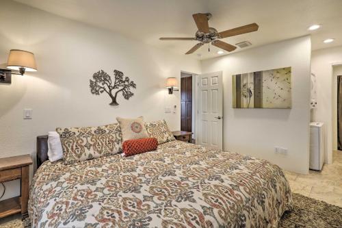 a bedroom with a bed and a ceiling fan at Sedona Casita on Thunder Mountain Walk to Trails in Sedona
