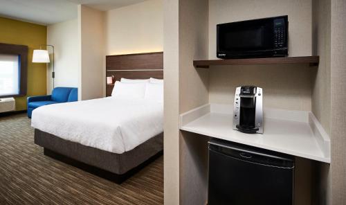 A television and/or entertainment centre at Holiday Inn Express & Suites - Brantford, an IHG Hotel