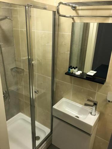 a bathroom with a shower and a sink at Basilica Guest House in Istanbul