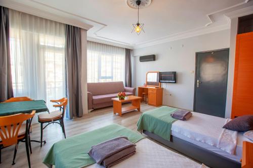 Кровать или кровати в номере HMA Hotel & Suites