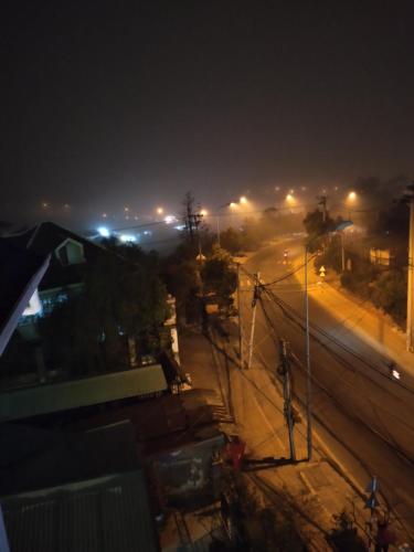 a view of a street at night with street lights at Luan'S Villa in Da Lat