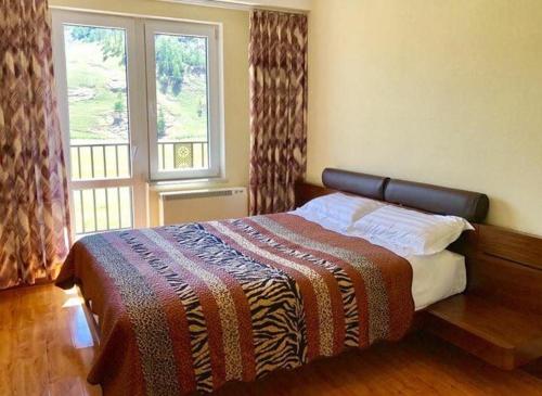 Llit o llits en una habitació de Takhi Resort Terelj