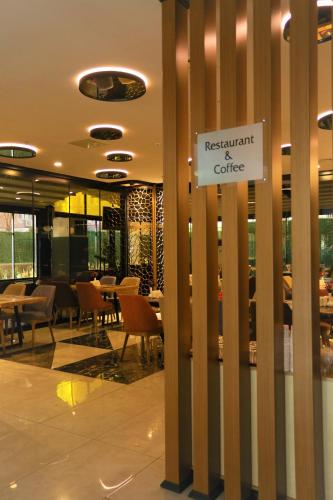 Χώρος καθιστικού στο New Garden Hotel