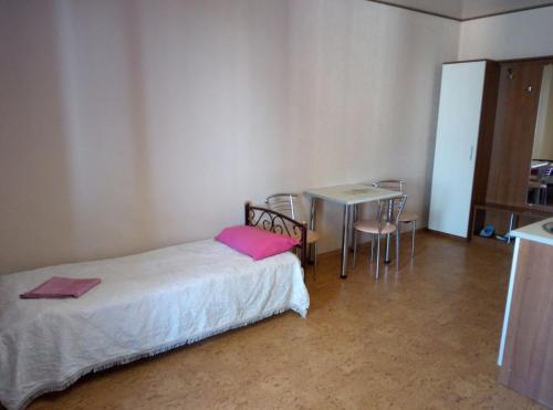 Cama o camas de una habitación en Aparthotel Flora