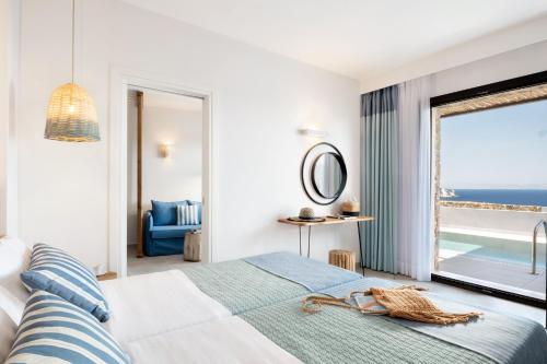 Postel nebo postele na pokoji v ubytování Varkotopi Villas