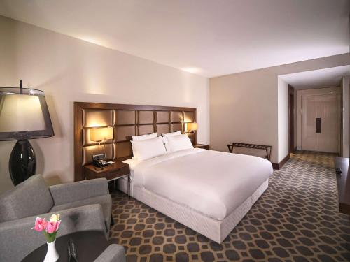 Postel nebo postele na pokoji v ubytování Mercure Istanbul West Hotel & Convention Center