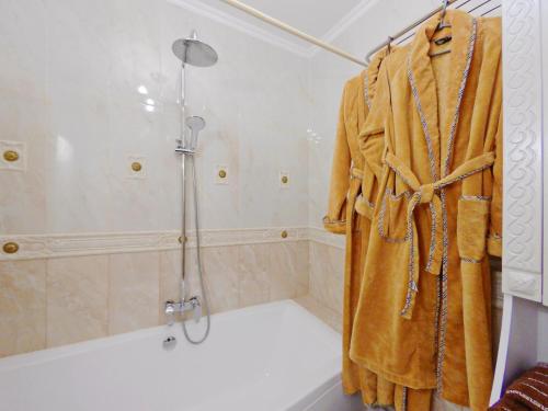 Ett badrum på Квартира посуточно в Соломенском районе