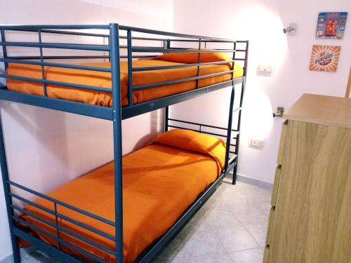 a bunk bed room with two bunk beds at fabrizio e caterina in San Vito lo Capo