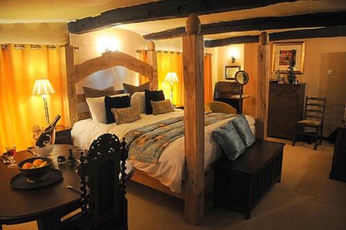A bed or beds in a room at The Frenchgate Restaurant & Hotel