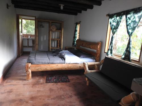 Postel nebo postele na pokoji v ubytování Posada Chaska
