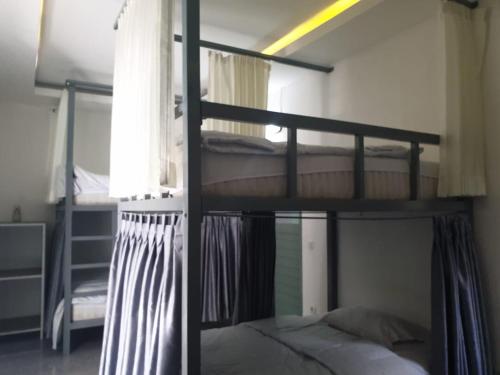 Ein Bett oder Betten in einem Zimmer der Unterkunft Nipah Villas