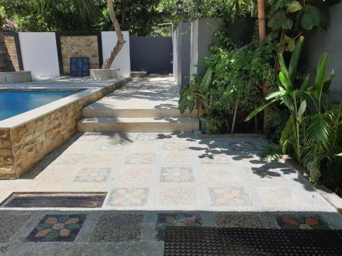 Der Swimmingpool an oder in der Nähe von Nipah Villas