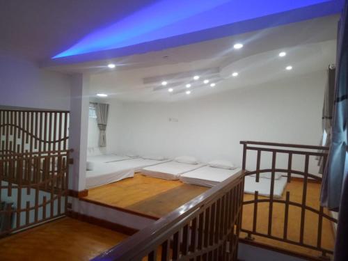 Postel nebo postele na pokoji v ubytování Budi Asih Guest house Syariah