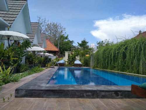 Πισίνα στο ή κοντά στο PITAMATA VILLAS