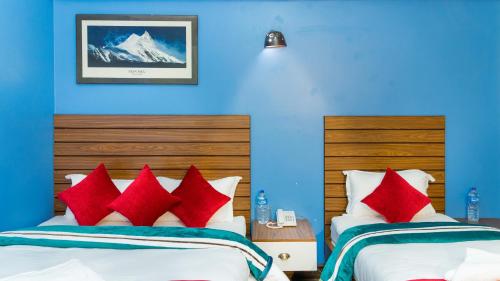 Postel nebo postele na pokoji v ubytování Hotel Nepal Bhumi