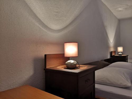 Tempat tidur dalam kamar di Kuća za odmor DIKKA Brušane Lika