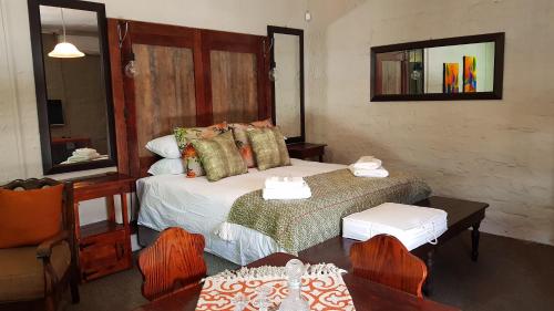 Postel nebo postele na pokoji v ubytování Rustique Paris Guest House