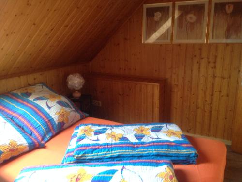 Ένα ή περισσότερα κρεβάτια σε δωμάτιο στο Haus Sonnenschein