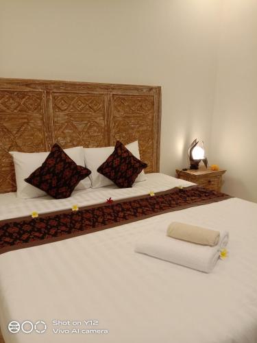 מיטה או מיטות בחדר ב-villa Rona1