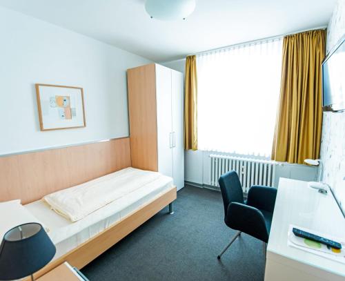 Postel nebo postele na pokoji v ubytování Hotel Flämischer Hof