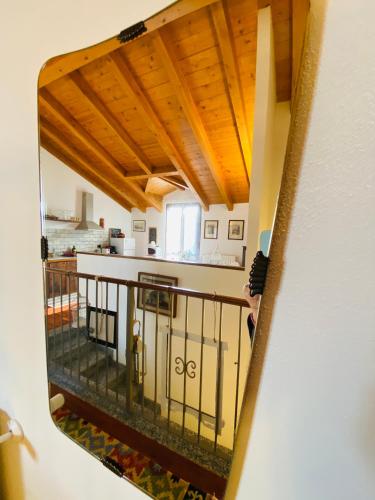 a view of a room with a balcony at Il nido della cicogna in Certosa di Pavia
