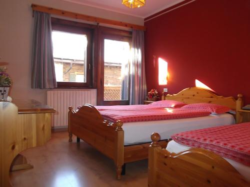 Postel nebo postele na pokoji v ubytování Hotel Adele