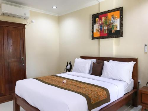Кровать или кровати в номере Villa Dira Ubud