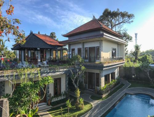 Afbeelding uit fotogalerij van Villa Dira Ubud in Ubud