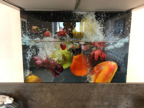 a bunch of fruits are being soaked in water at Feriendomizil strasser in Homburg