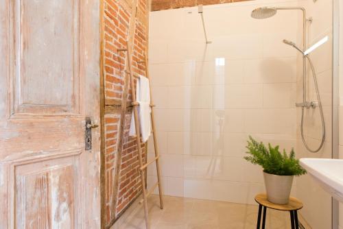 a bathroom with a shower and a sink at Palais Wunderlich in Lahr