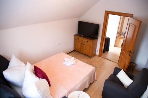 Ένα ή περισσότερα κρεβάτια σε δωμάτιο στο Apartments Marie A