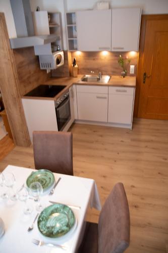 Η κουζίνα ή μικρή κουζίνα στο Apartments Marie A