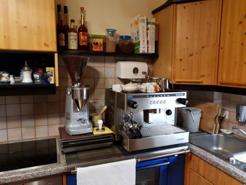 a kitchen with a coffee maker on a counter at Villa Carla in Ehrenhausen