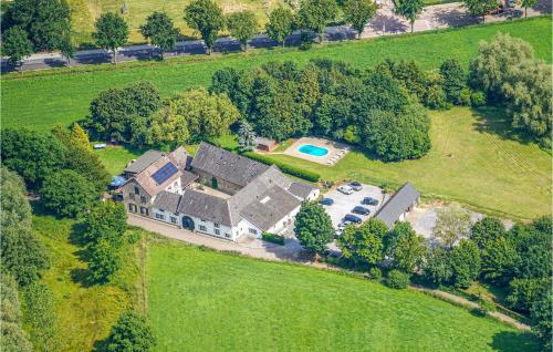 an aerial view of a large house in a field at Nice Home In Simpelveld With Wifi in Simpelveld