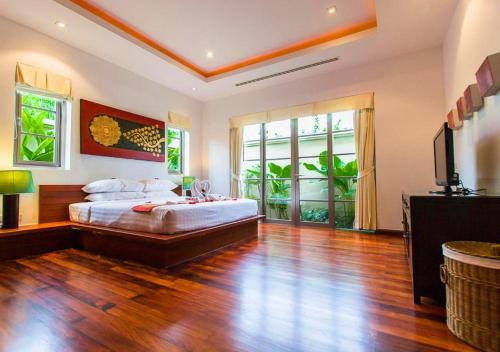 Katil atau katil-katil dalam bilik di The Residence Bantao Villa unit 121