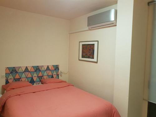 Postel nebo postele na pokoji v ubytování APARTAMENTO LOS BÚHOS