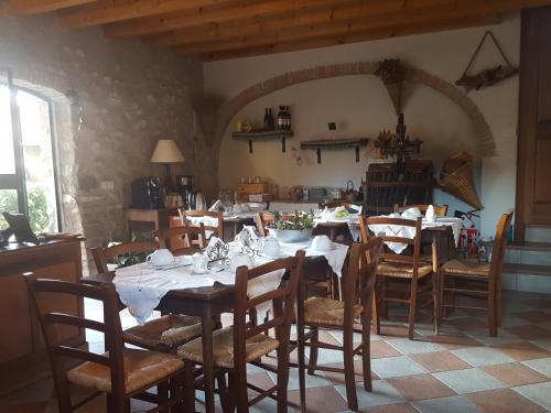 Restaurace v ubytování Le Quattro Stagioni B&B and Apartament