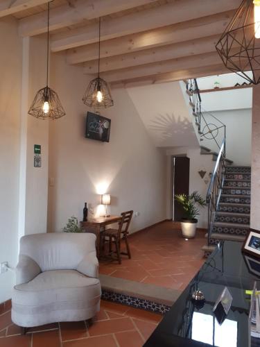 TV a/nebo společenská místnost v ubytování Hotel Del Valle