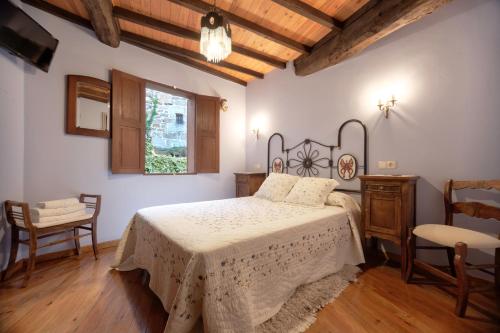 Posteľ alebo postele v izbe v ubytovaní Casa dos Ulloa
