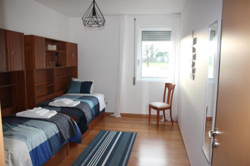 Postel nebo postele na pokoji v ubytování Casa da Juka