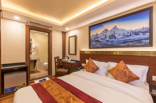 Postel nebo postele na pokoji v ubytování Thamel Boutique Hotel