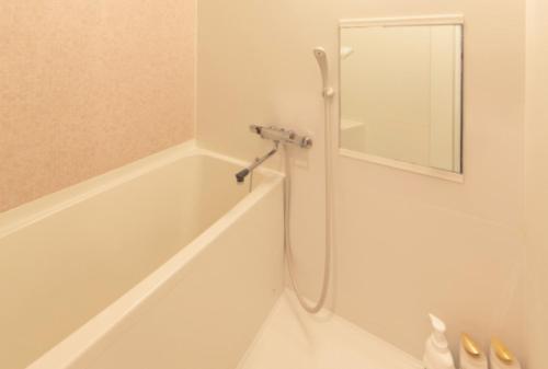 Ένα μπάνιο στο Eight Residence Osaka