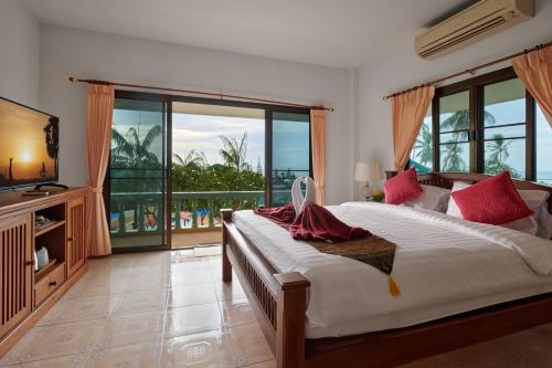 Postel nebo postele na pokoji v ubytování Samui Reef View Resort