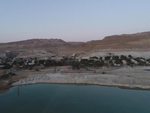 an aerial view of a body of water at NEVE ZOHAR DEAD SEA in Neve Zohar