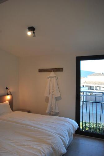 Llit o llits en una habitació de Villa Marièle